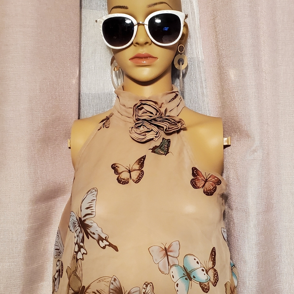 Shear sleeveless  butterfly top